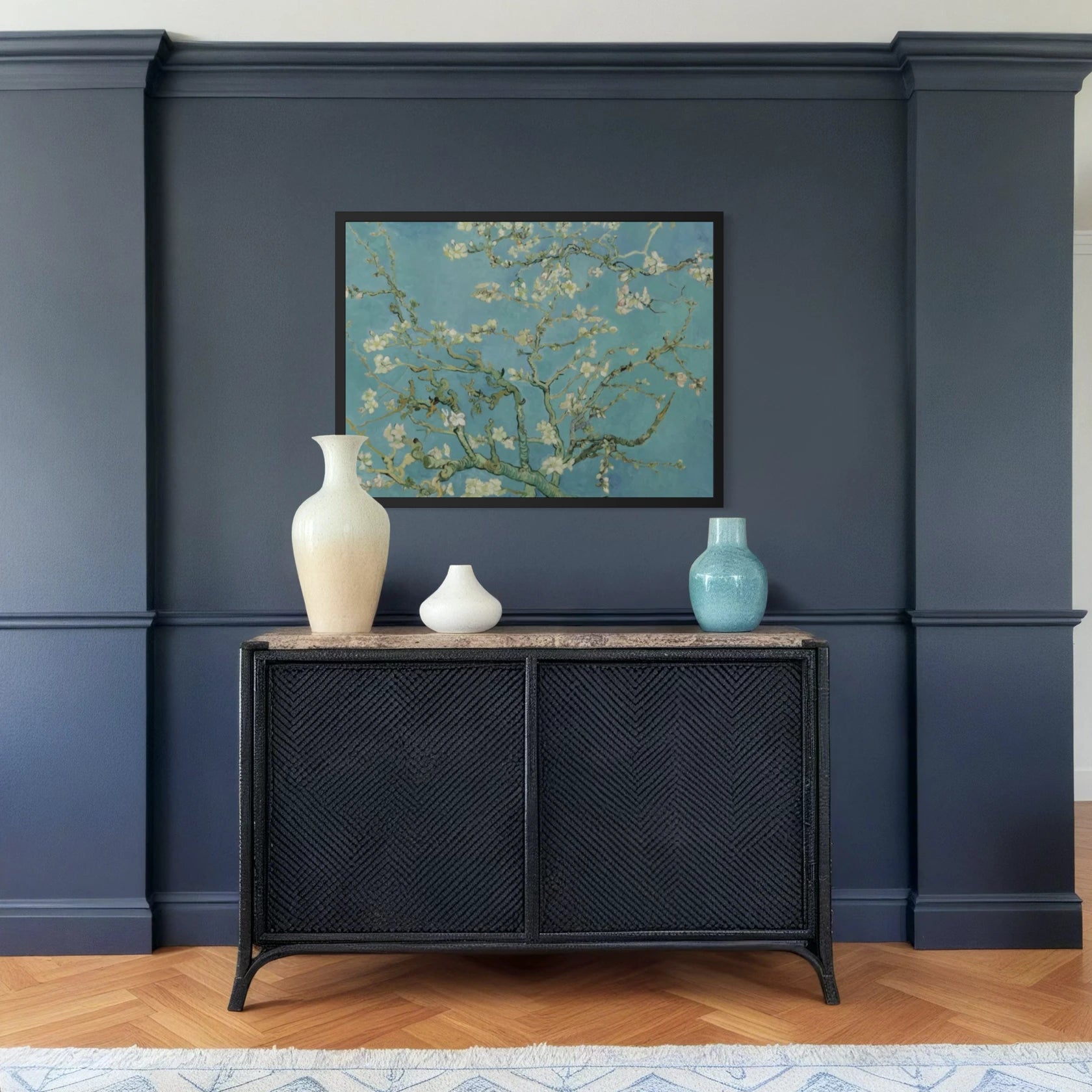 Framed Blossoming Almond Tree by Vincent van Gogh wall art hanging on a wall in a modern interior.