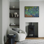 Framed Irises by Vincent van Gogh wall art hanging on a wall in a modern interior.
