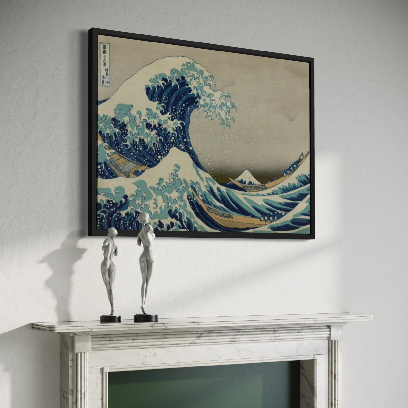 Framed The Great Wave off Kanagawa by Hokusai wall art hanging on a wall in a modern interior.