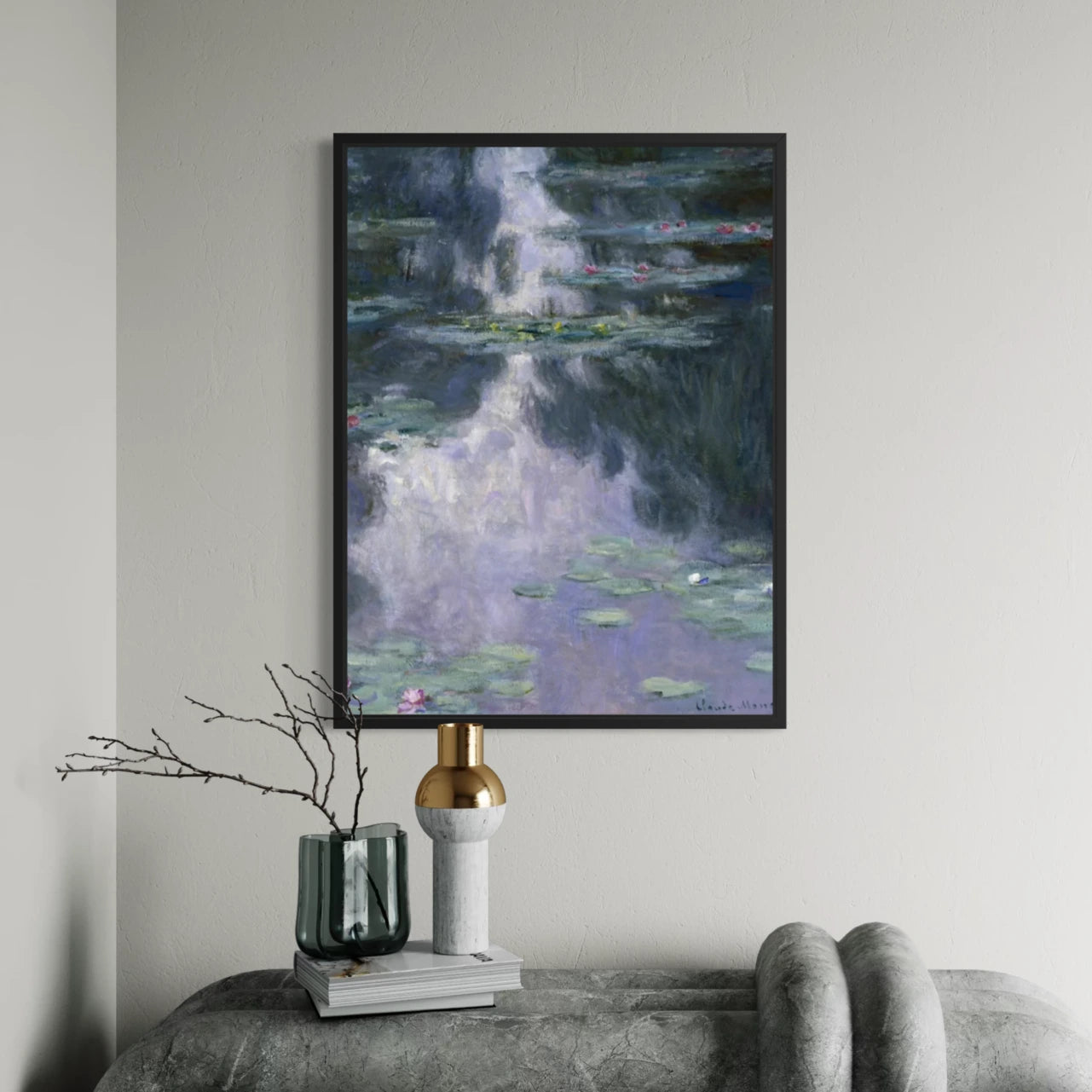 Framed Water Lilies (Nymphéas) by Claude Monet wall art hanging on a wall in a modern interior.
