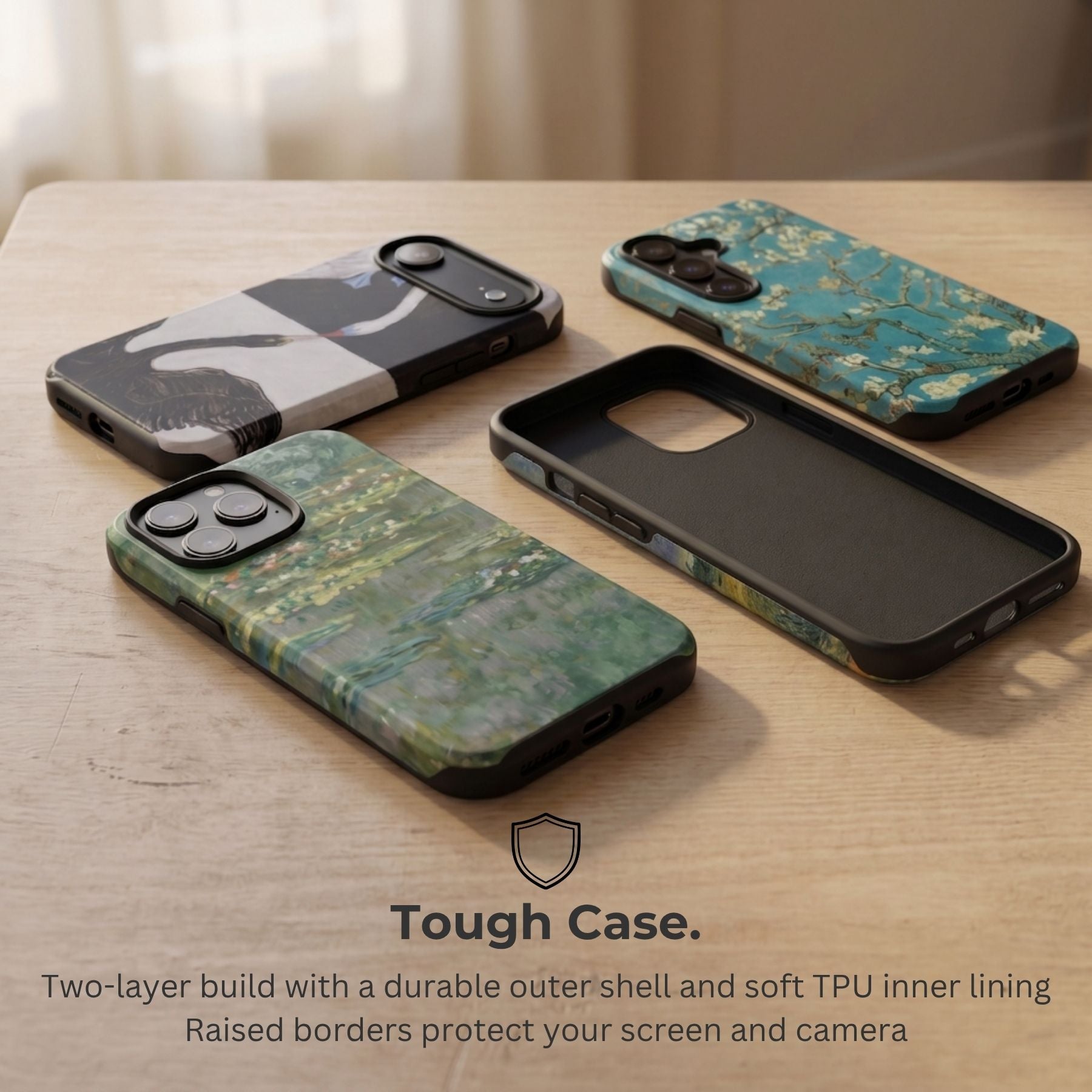 ArtRelit Tough Case covers with fine art prints, showing the dual-layer build and shock-absorbing TPU lining.